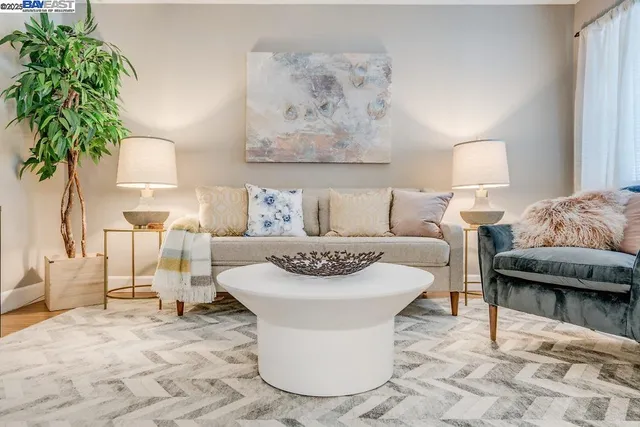 a bedroom with a bed and a night lamp