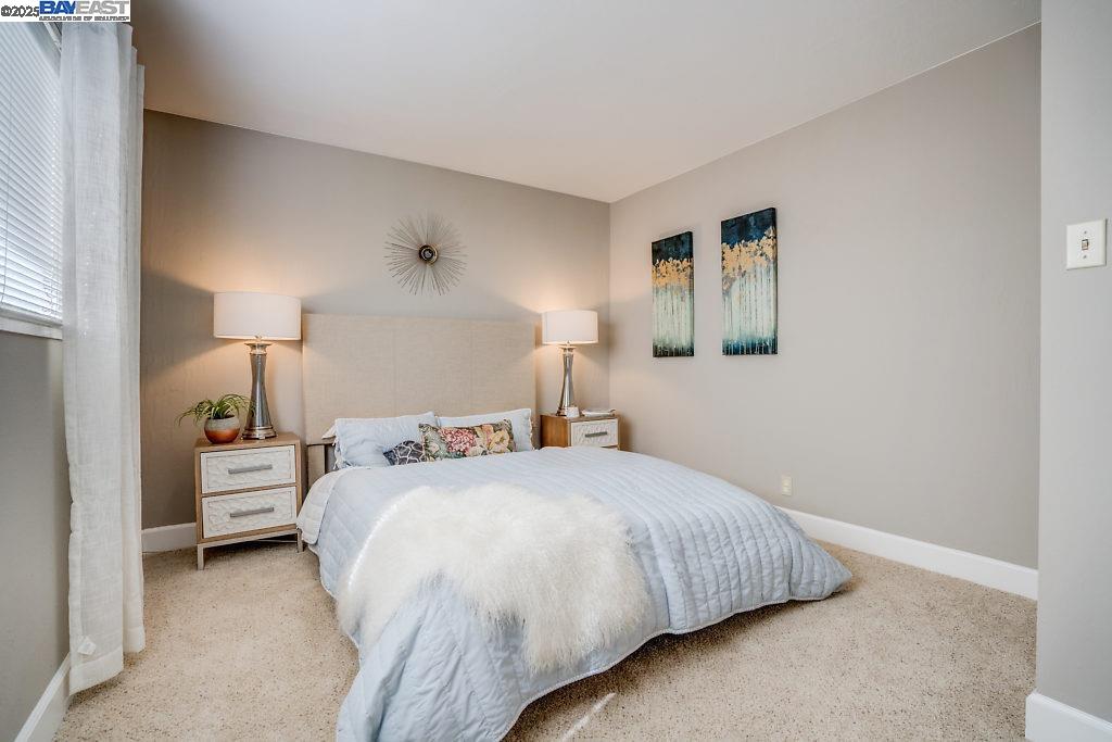 2093 Mt Diablo Street Concord, CA 94520 - Photo 16 of 16 a bedroom with a bed and a night lamp