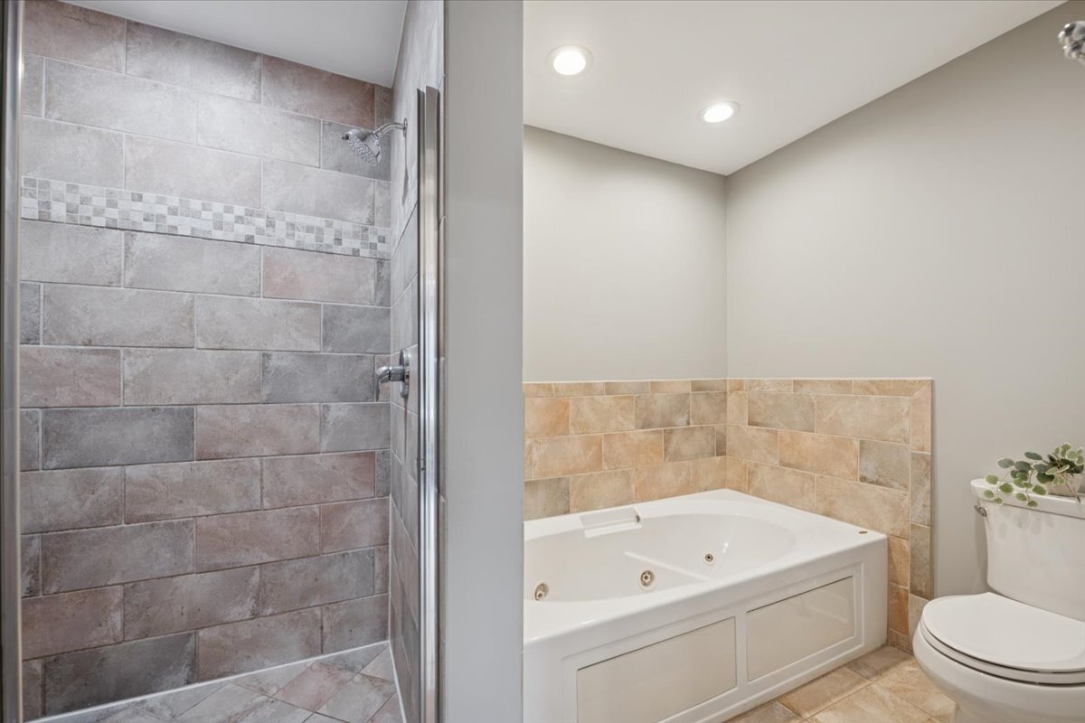 1234 North Milwaukee Avenue, Unit 3 Chicago, IL 60622 - Photo 12 of 16 a bathroom with a bathtub a shower a toilet and a sink
