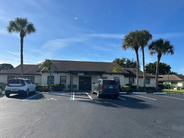 a view of a house with dining room and furniture