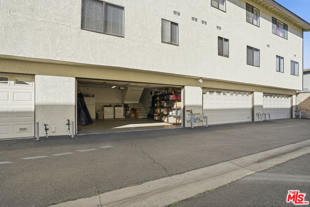 19355 Sherman Way, Unit 42 Reseda, CA 91335 - Photo 34 of 41 a view of a building with a street