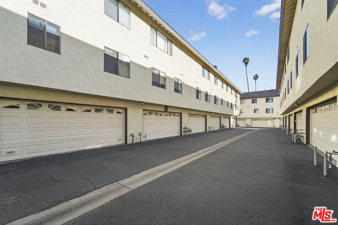 19355 Sherman Way, Unit 42 Reseda, CA 91335 - Photo 35 of 41 a view of a building with a street