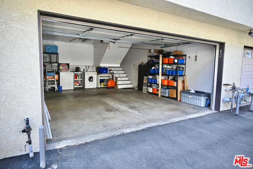 19355 Sherman Way, Unit 42 Reseda, CA 91335 - Photo 36 of 41 a view of storage and utility room