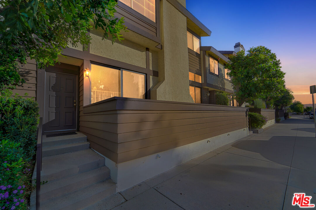 19355 Sherman Way, Unit 42 Reseda, CA 91335 - Photo 41 of 41 a view of outdoor space and deck