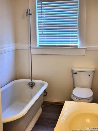 a bathroom with a sink and a toilet