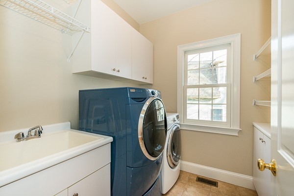 11 Oakland Street Lexington, MA 02420 - Photo 14 of 30 a utility room with dryer and washer