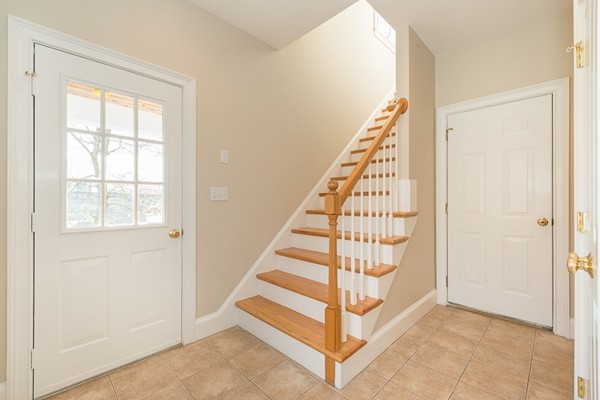 11 Oakland Street Lexington, MA 02420 - Photo 15 of 30 a view of entryway with wooden floor