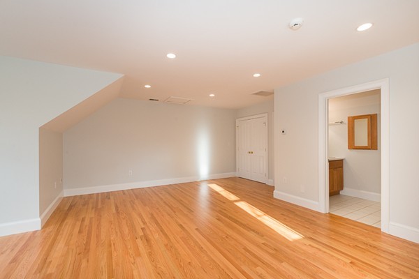 11 Oakland Street Lexington, MA 02420 - Photo 17 of 30 a view of empty room with wooden floor