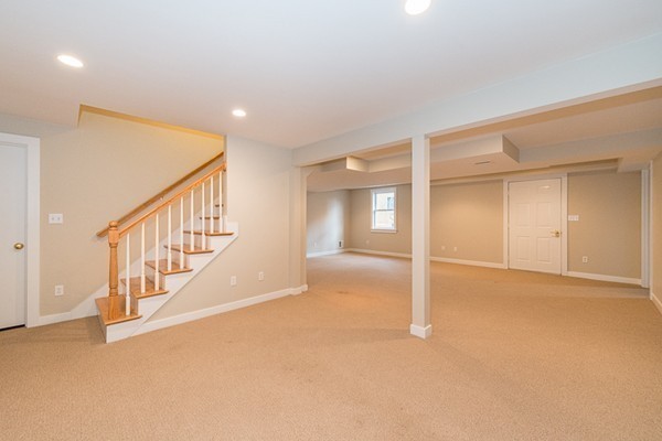 11 Oakland Street Lexington, MA 02420 - Photo 30 of 30 a view of an empty room with stairs