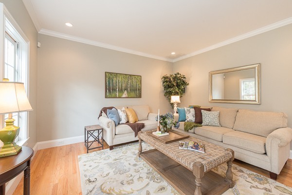 11 Oakland Street Lexington, MA 02420 - Photo 4 of 30 a living room with furniture and a wooden floor