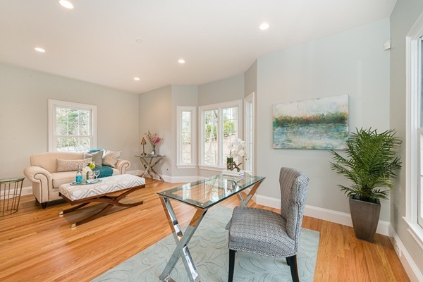 11 Oakland Street Lexington, MA 02420 - Photo 7 of 30 a living room with furniture floor to ceiling window and wooden floor