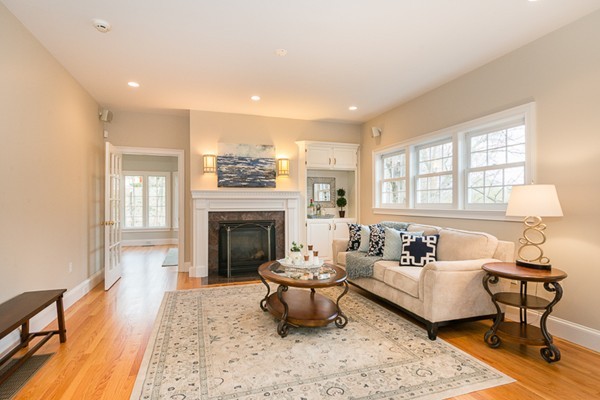 11 Oakland Street Lexington, MA 02420 - Photo 8 of 30 a living room with furniture and a fireplace