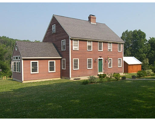 6 Adams Road North Brookfield, MA 01535 - Photo 1 of 19 a front view of a house with a yard