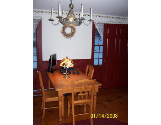6 Adams Road North Brookfield, MA 01535 - Photo 12 of 19 a dining room with a table and chairs