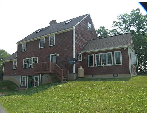 6 Adams Road North Brookfield, MA 01535 - Photo 16 of 19 front view of house with a yard