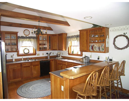 6 Adams Road North Brookfield, MA 01535 - Photo 4 of 19 a kitchen with stainless steel appliances granite countertop a sink and a stove