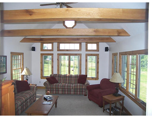 6 Adams Road North Brookfield, MA 01535 - Photo 7 of 19 a living room with furniture and a floor to ceiling window