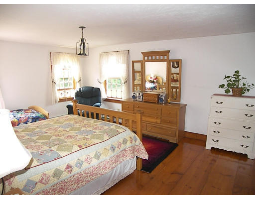 6 Adams Road North Brookfield, MA 01535 - Photo 9 of 19 a bed room with a bed window and dresser
