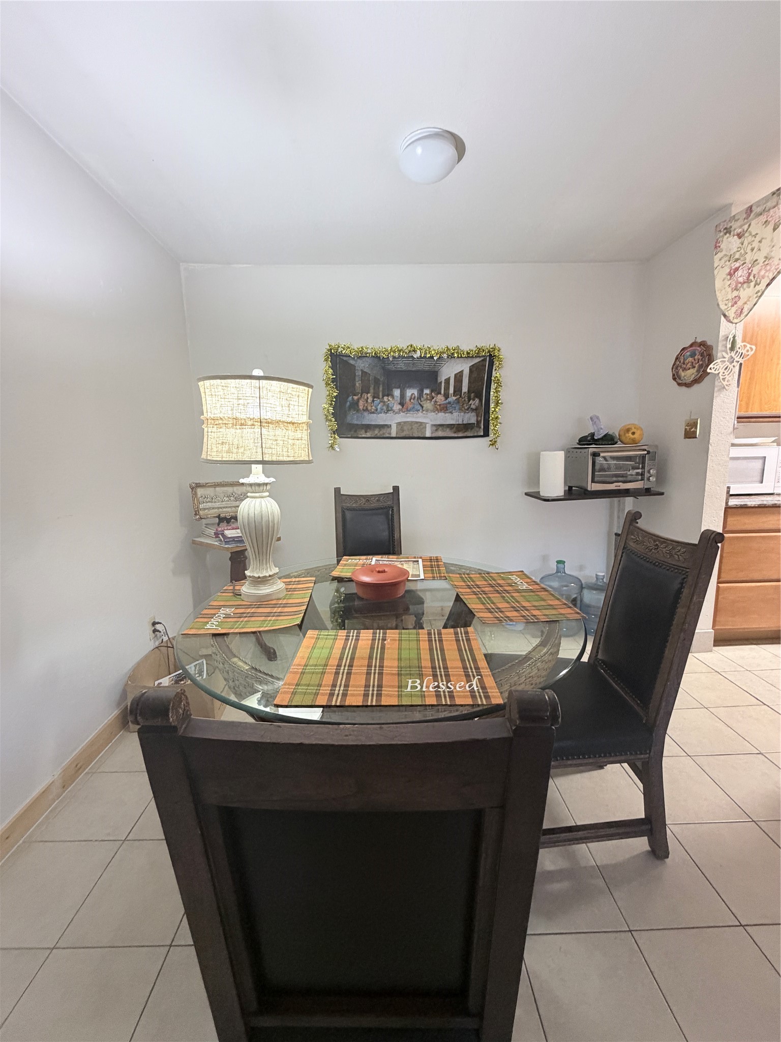 10100 South Gessner Road, Unit 606 Houston, TX 77071 - Photo 4 of 12 a view of a dining room with furniture and window