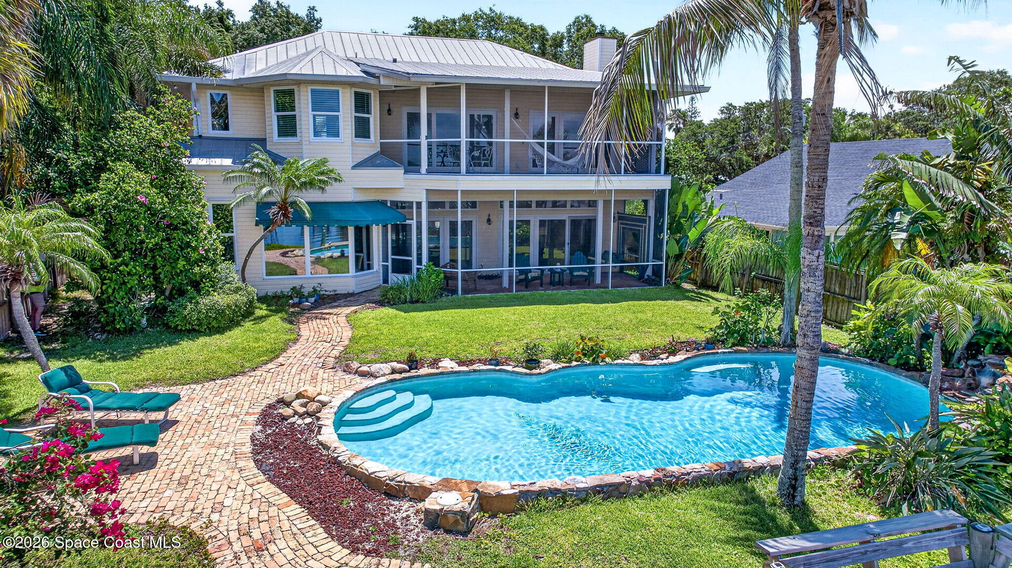 5930 Riverside Drive Melbourne Beach, FL 32951 - Photo 2 of 65 Rear View w Pool
