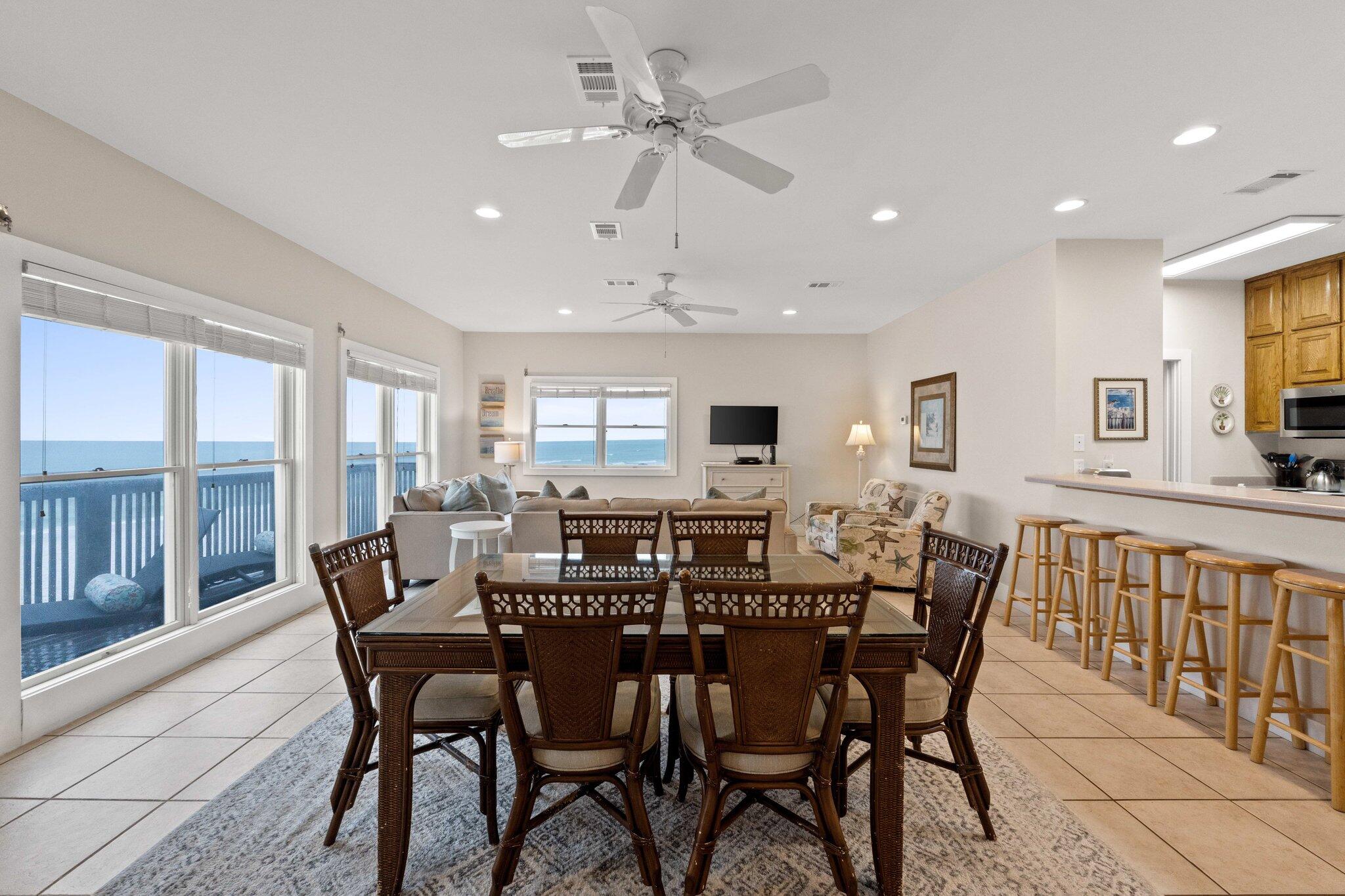 17 Fort Panic Road Santa Rosa Beach, FL 32459 - Photo 11 of 19 a view of a dining room with furniture window and outside view