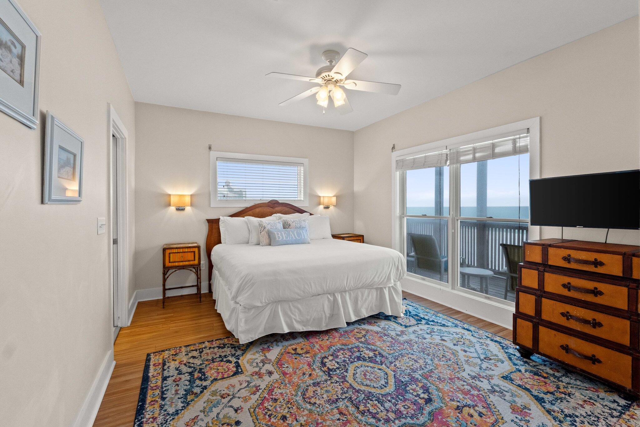 17 Fort Panic Road Santa Rosa Beach, FL 32459 - Photo 12 of 19 a bedroom with a bed and flat screen tv