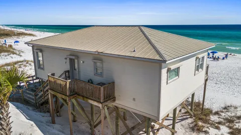 a backyard of a house with seating space