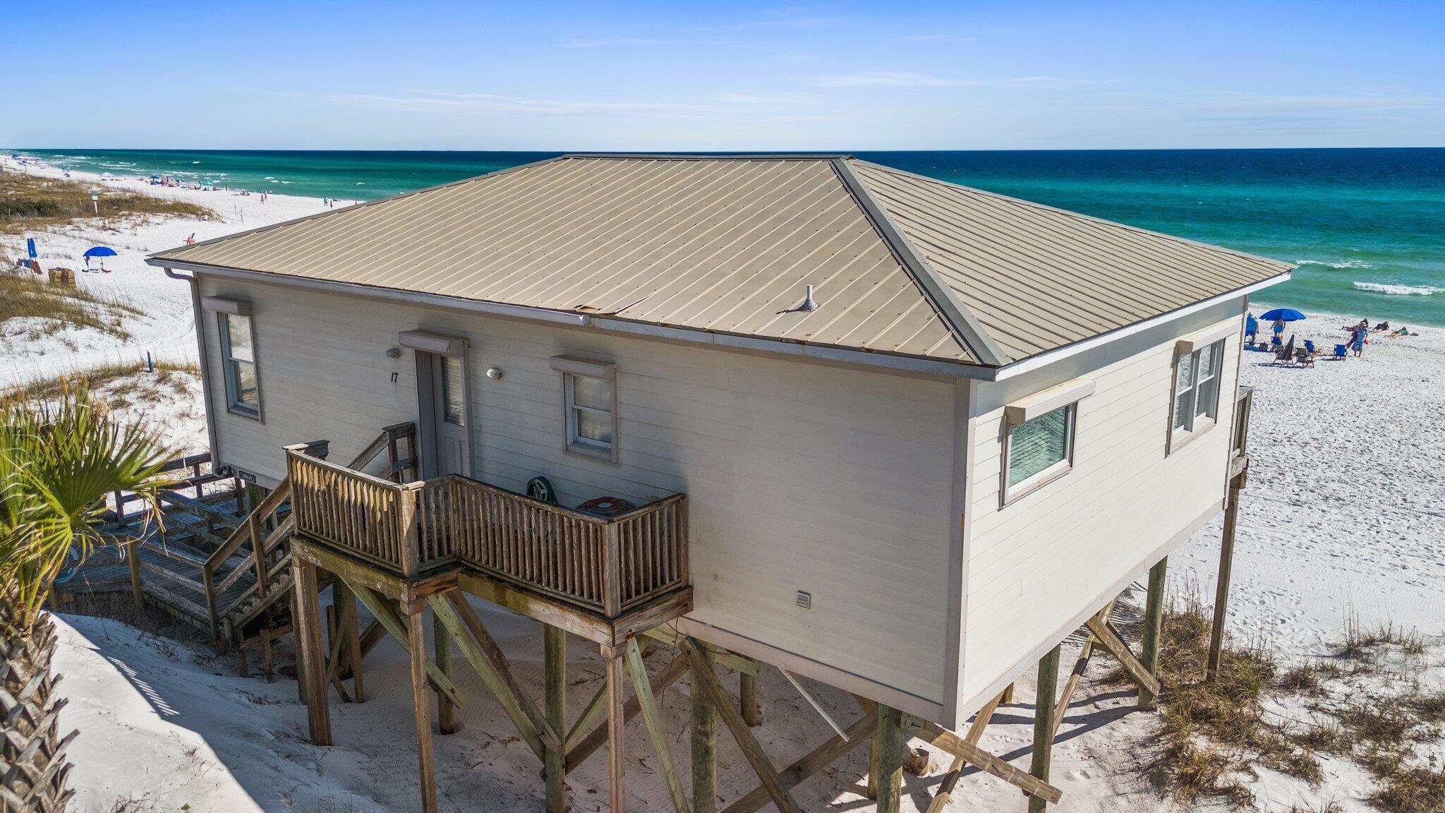 17 Fort Panic Road Santa Rosa Beach, FL 32459 - Photo 5 of 19 a backyard of a house with seating space