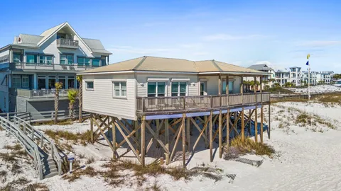 a front view of a house with swimming pool