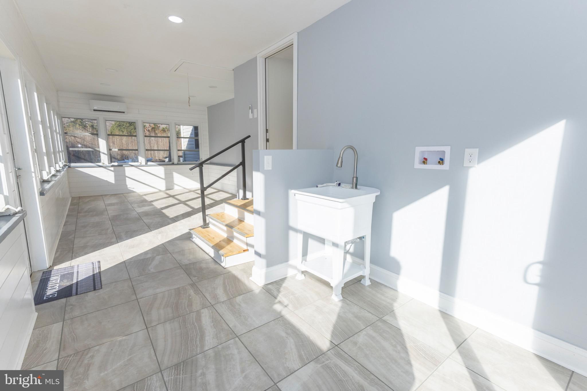 49151 Wynne Road Ridge, MD 20680 - Photo 52 of 80 Bright and airy entryway with modern charm.