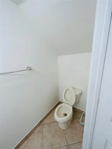 a bathroom with a toilet