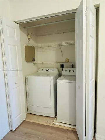a utility room with a washer and dryer