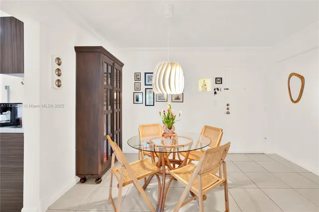 a kitchen with stainless steel appliances a stove a sink and a refrigerator