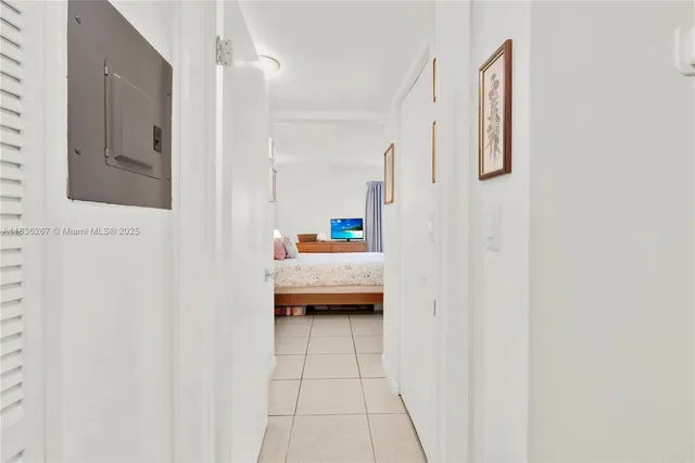 a bedroom with bed and a window