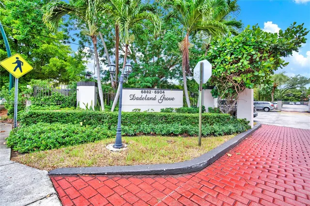 a view of swimming pool with a yard