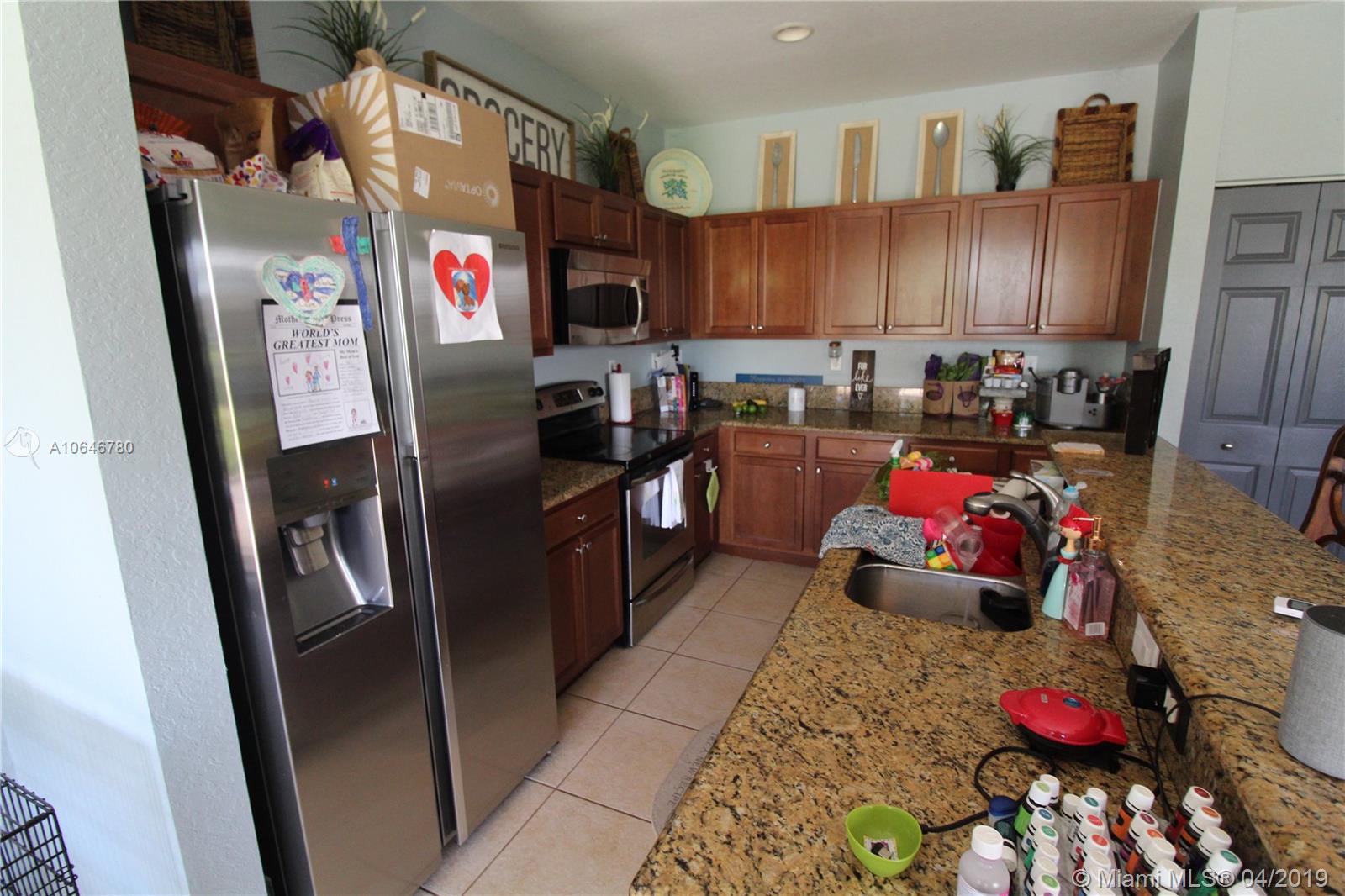 10440 Southwest 228th Terrace Miami, FL 33190 - Photo 4 of 22