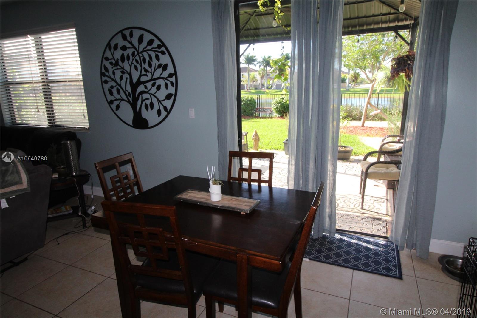 10440 Southwest 228th Terrace Miami, FL 33190 - Photo 6 of 22