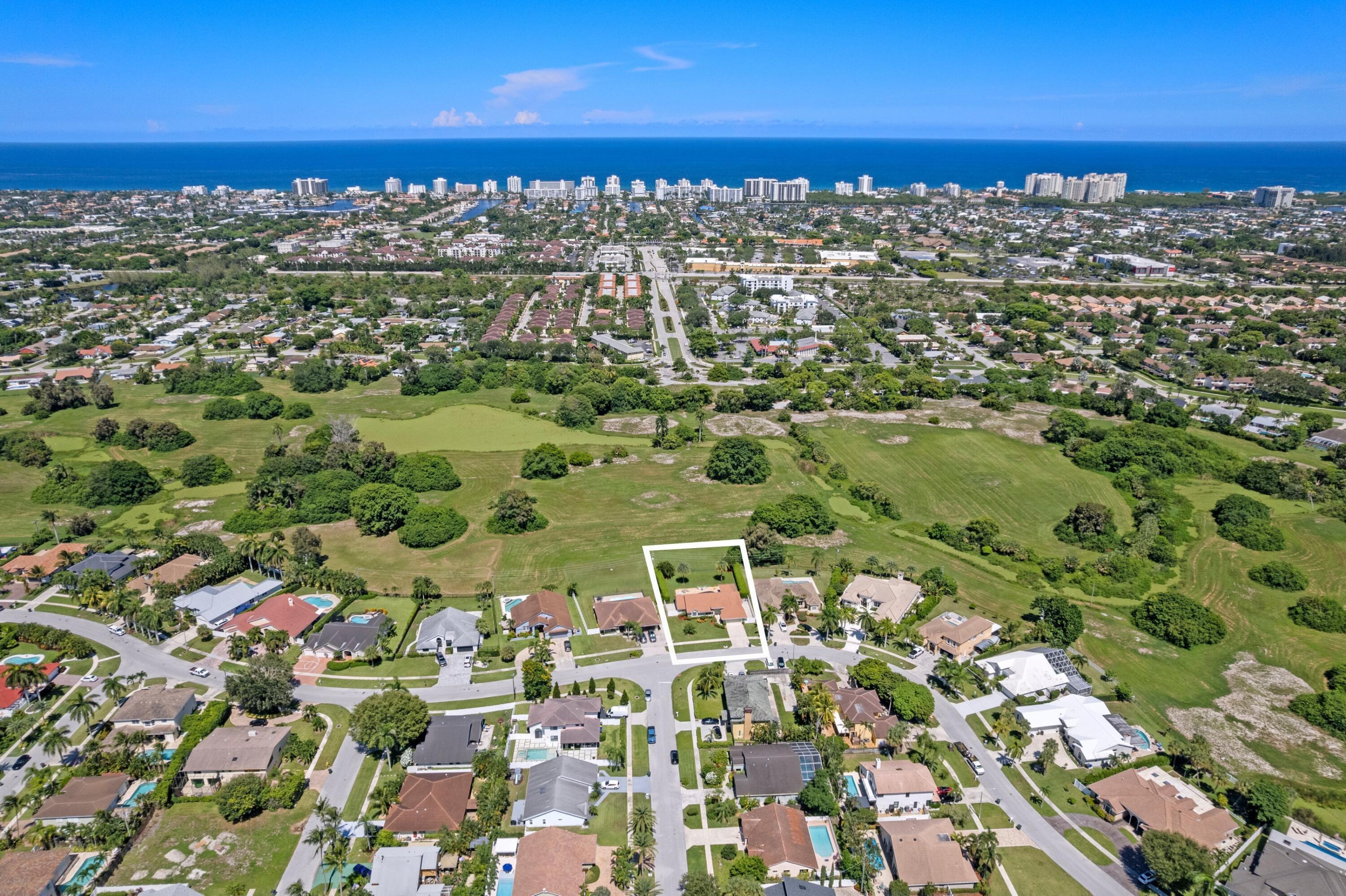 7598 Fairway Trail Boca Raton, FL 33487 - Photo 30 of 50 a view of roof with city view