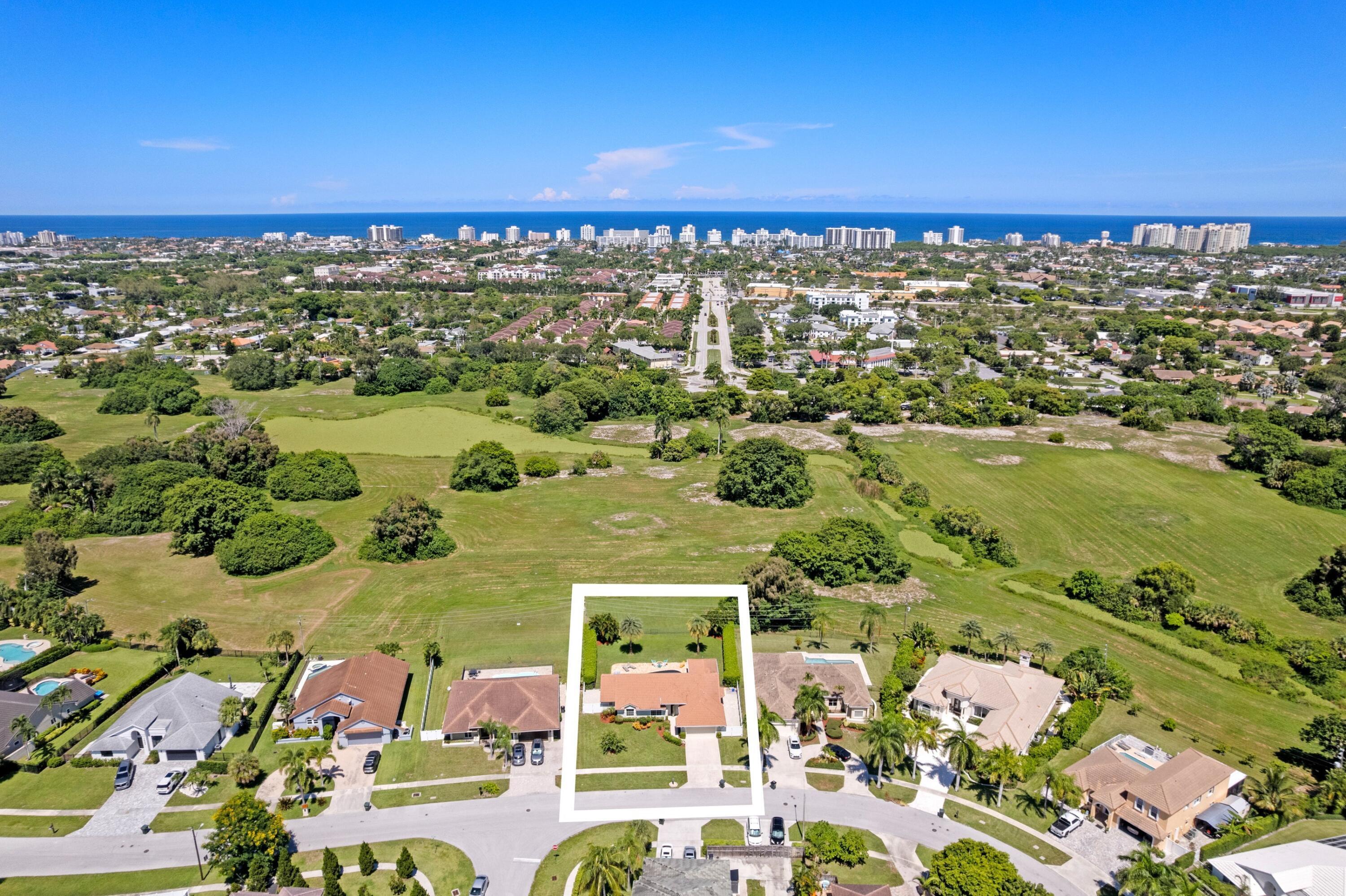 7598 Fairway Trail Boca Raton, FL 33487 - Photo 4 of 50 a view of a city