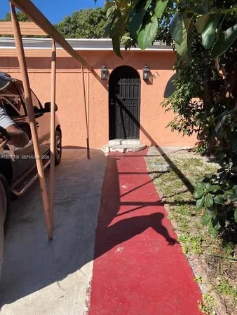 a view of outdoor space and front view of a house
