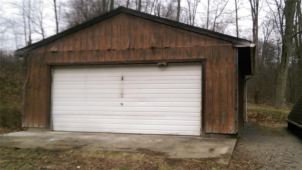 3437 Frew Mill Road New Castle, PA 16101 - Photo 3 of 12 Large garage with utilities and concrete floor