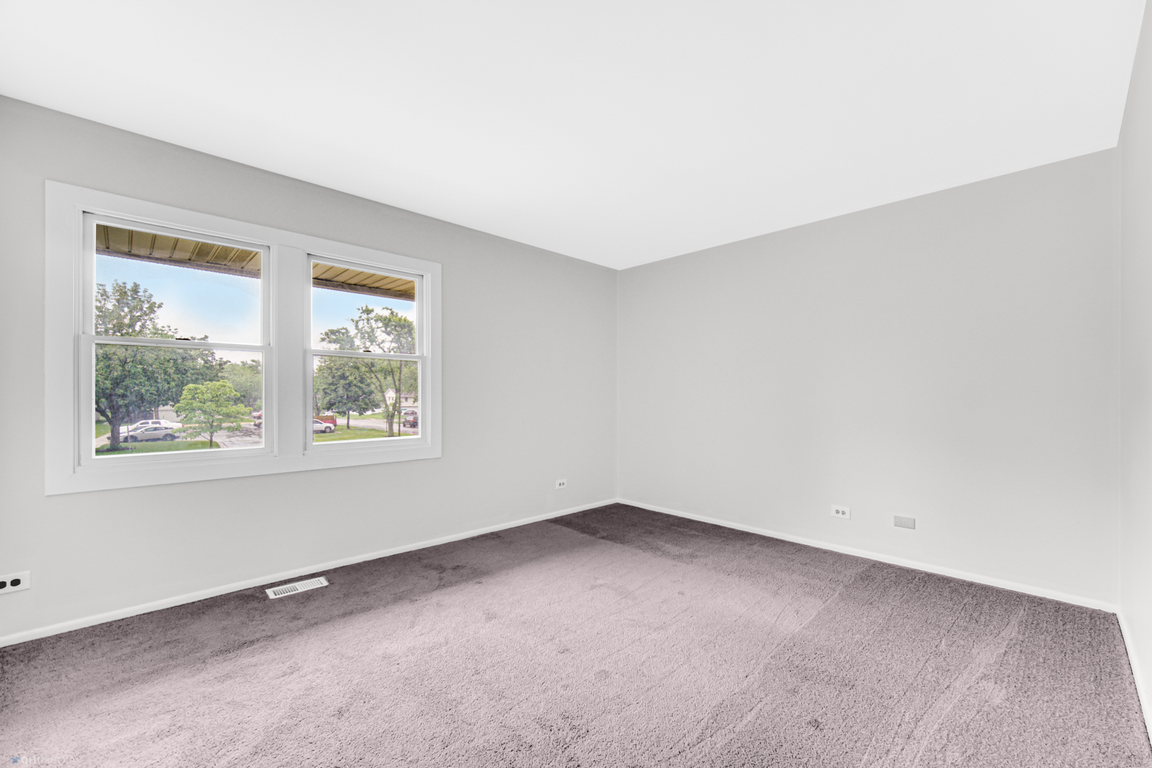 1765 Short Avenue Streamwood, IL 60107 - Photo 14 of 18 an empty room with a window