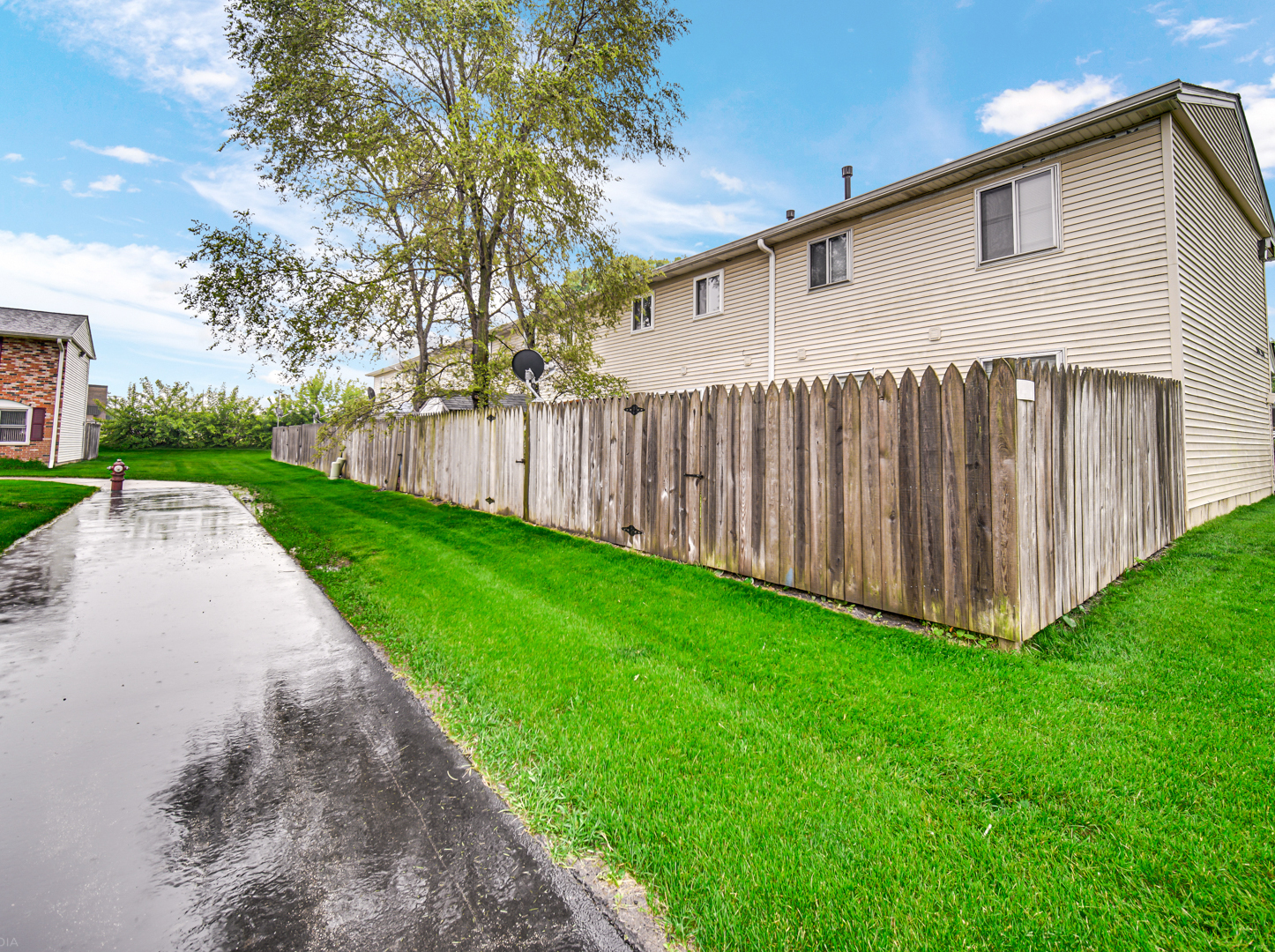 1765 Short Avenue Streamwood, IL 60107 - Photo 17 of 18 a backyard of a house with lots of green space