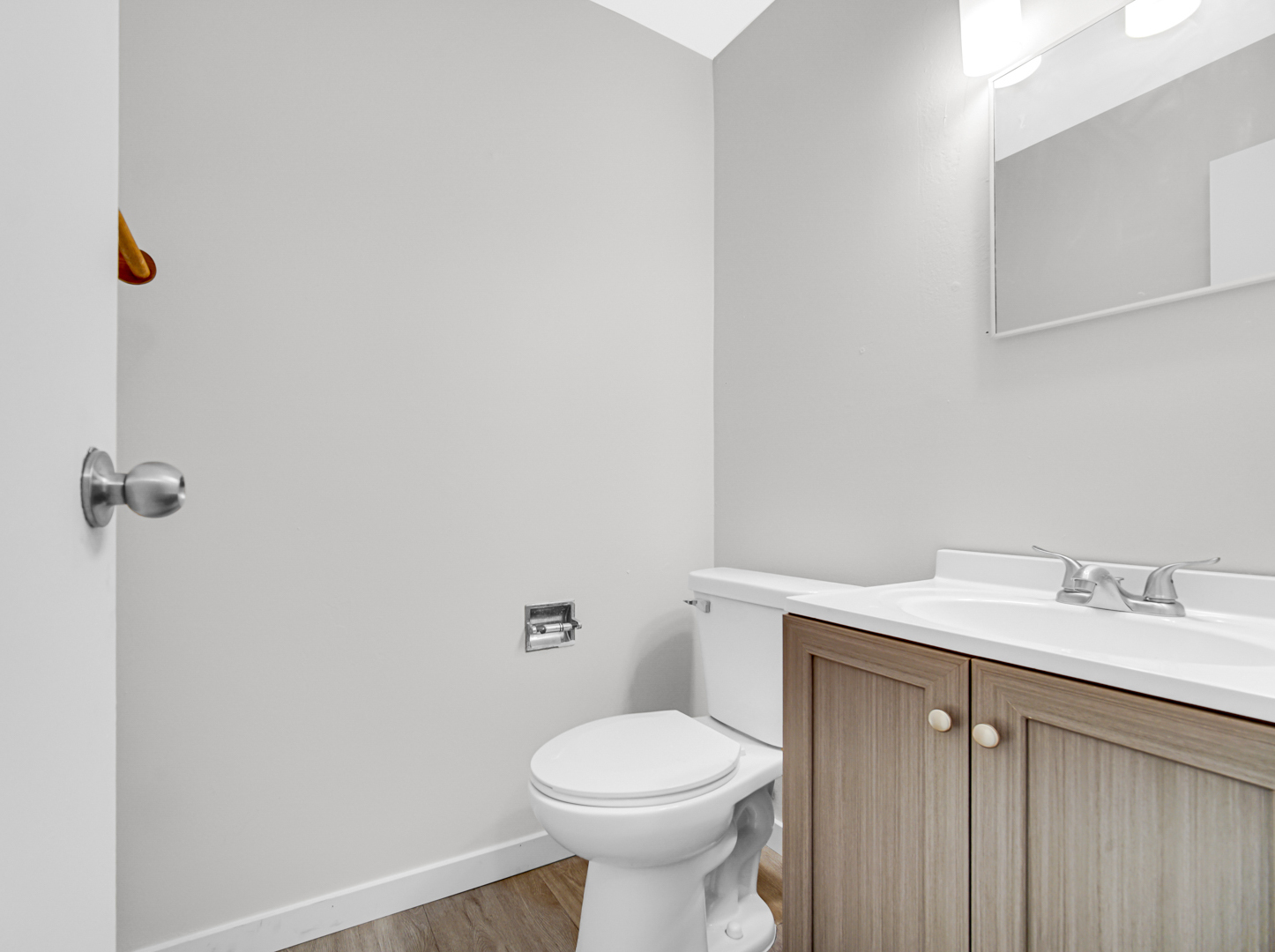 1765 Short Avenue Streamwood, IL 60107 - Photo 6 of 18 a bathroom with a sink toilet and a mirror