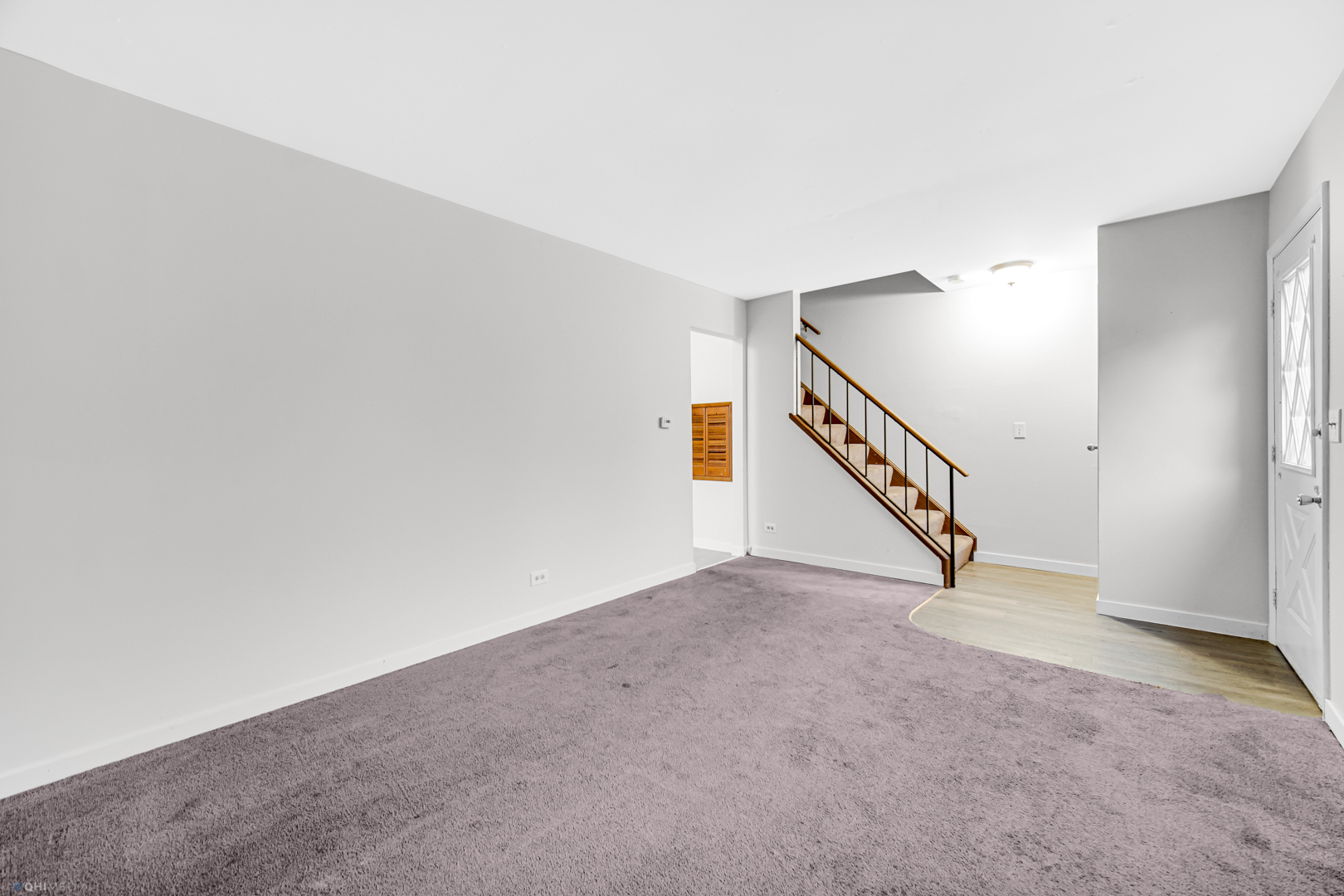 1765 Short Avenue Streamwood, IL 60107 - Photo 10 of 18 a view of an empty room with stairs