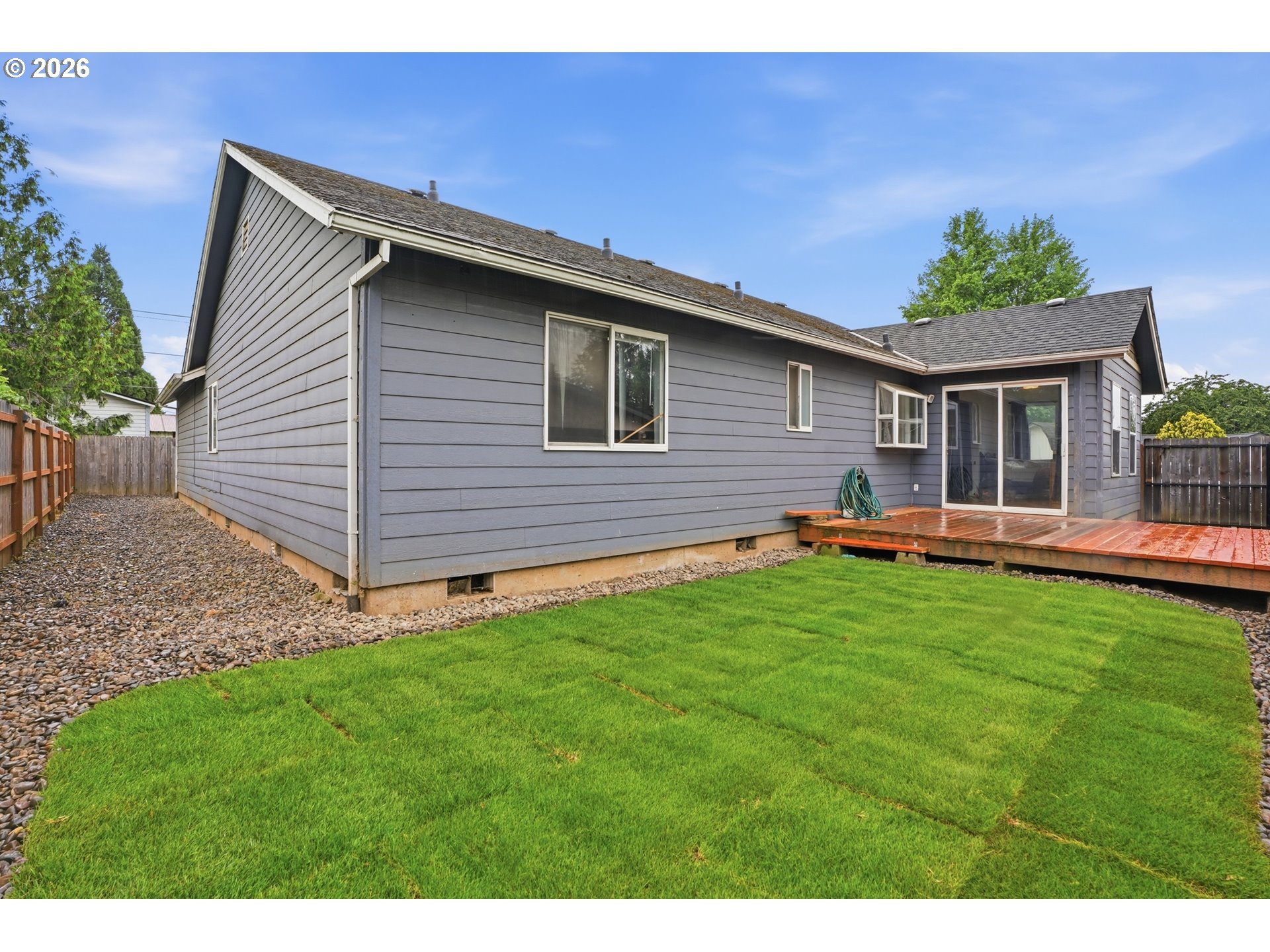 105 Toliver Road Molalla, OR 97038 - Photo 25 of 34 a backyard of a house with table and chairs