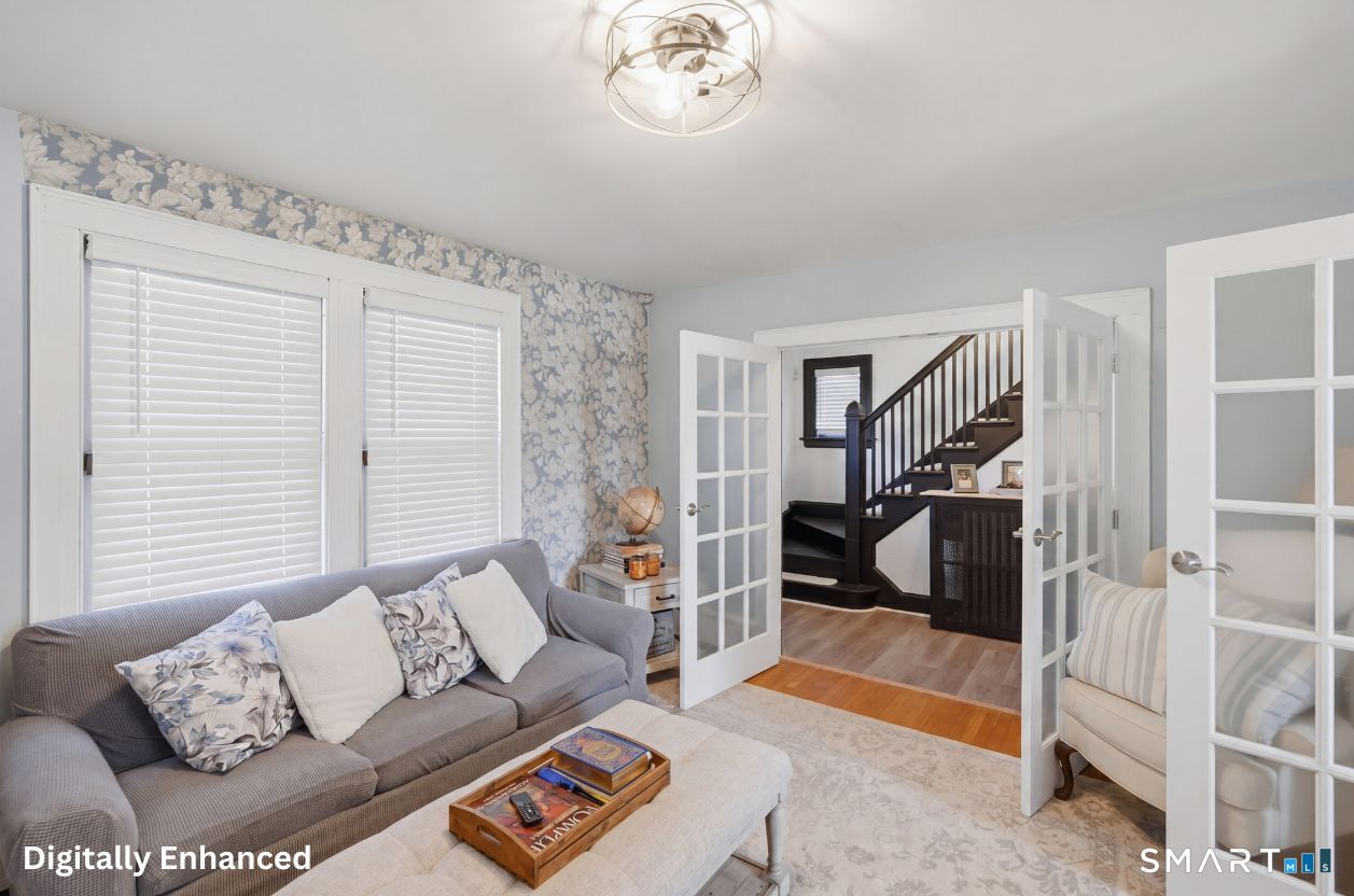 443 Highland Avenue Waterbury, CT 06708 - Photo 4 of 24 a living room with furniture and a rug