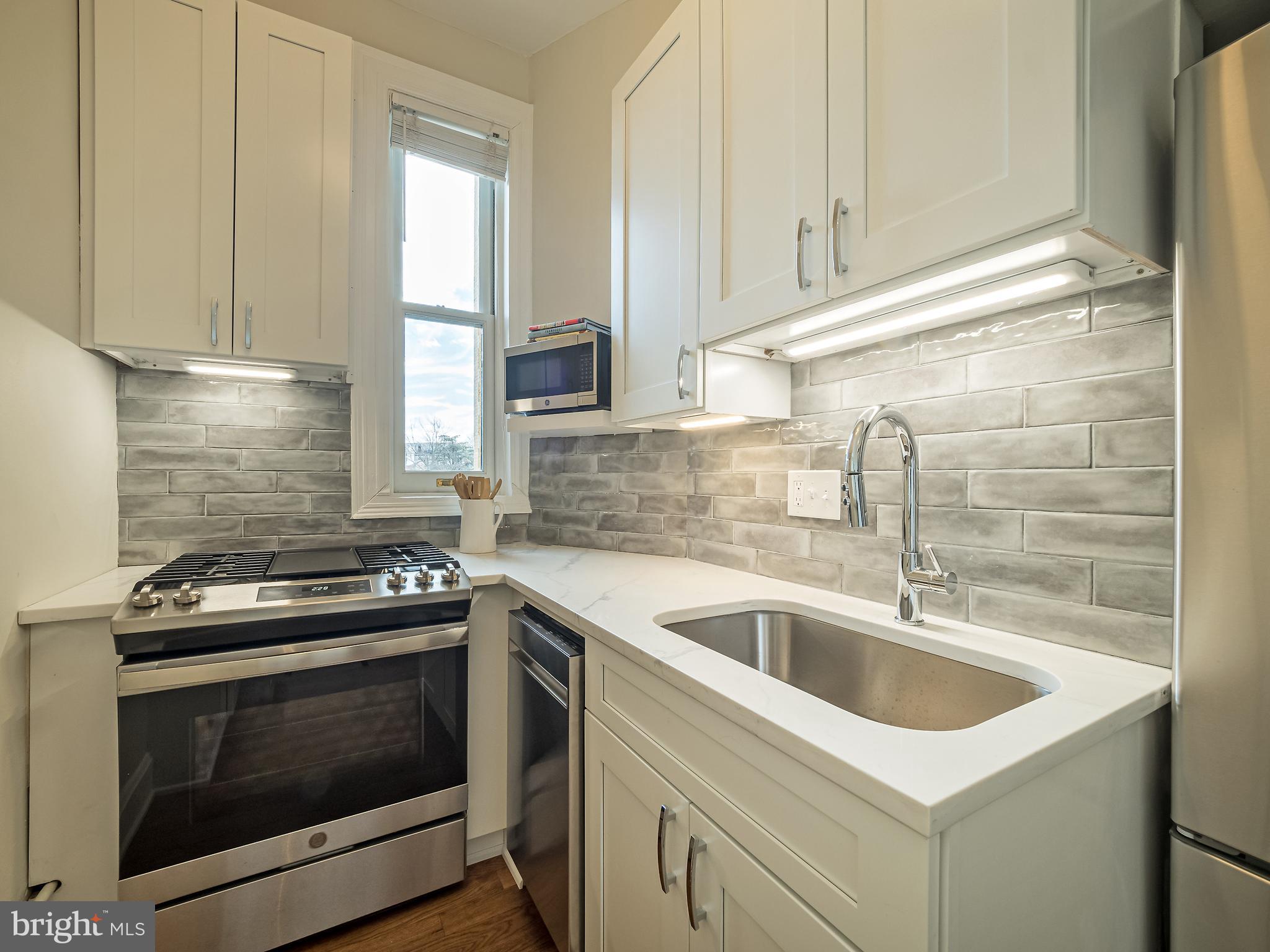 2853 Ontario Road Northwest, Unit 318 Washington, DC 20009 - Photo 15 of 34 Quartz countertops