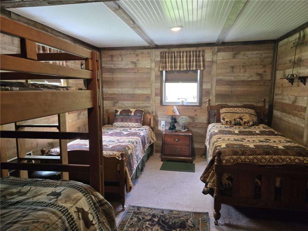 23 Rock Hill Road Weedville, PA 15868 - Photo 13 of 35 a bedroom with a bed next to a window