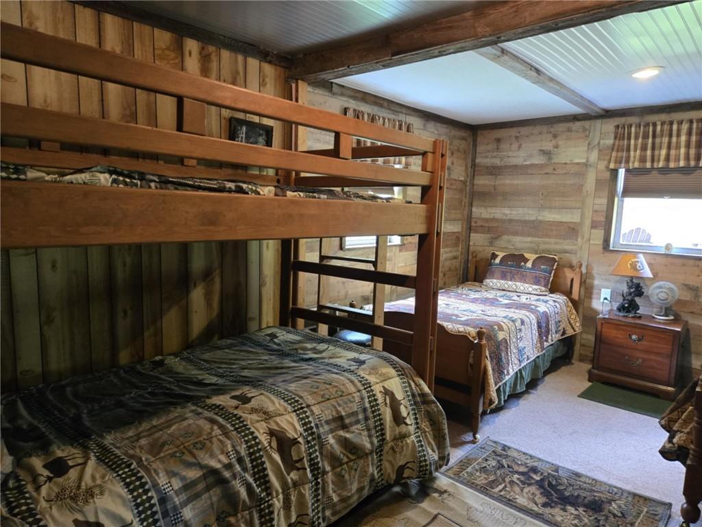 23 Rock Hill Road Weedville, PA 15868 - Photo 14 of 35 a bedroom with a bed next to a window